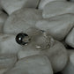 "Silver flower black stone ring"