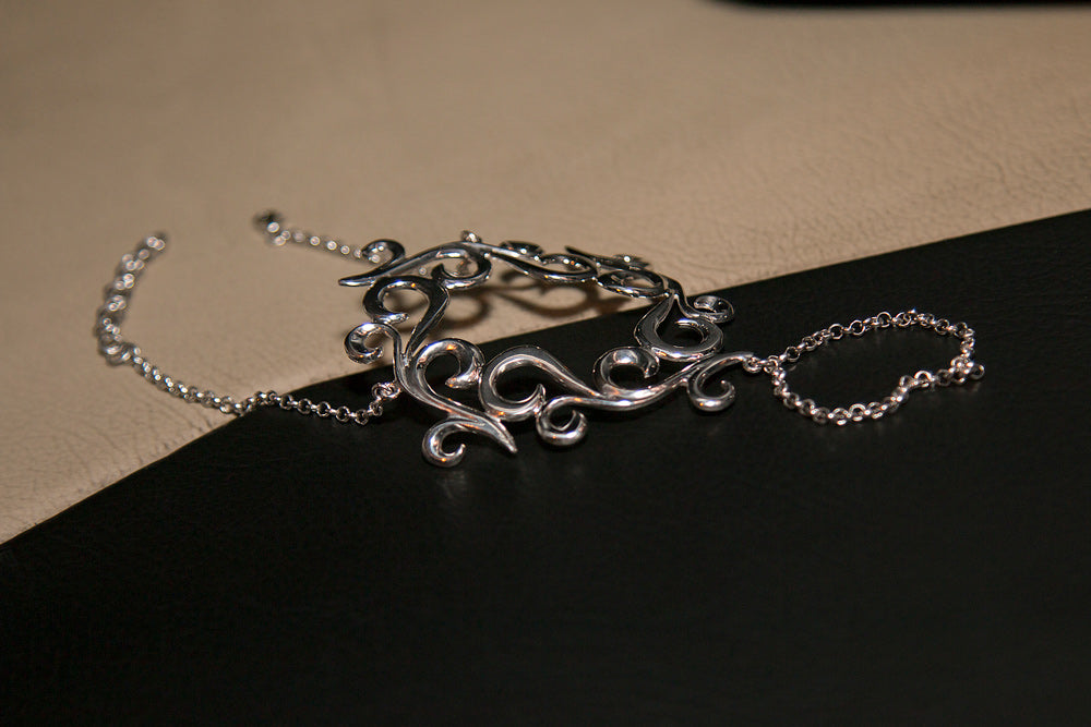 Sterling silver hand chain “Gia”