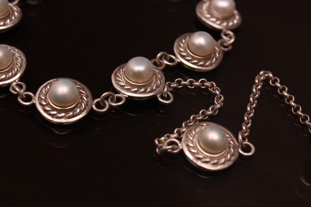 Sterling silver ring-chain bracelet “Eva” with pearls